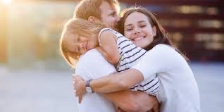 Parent and child embracing